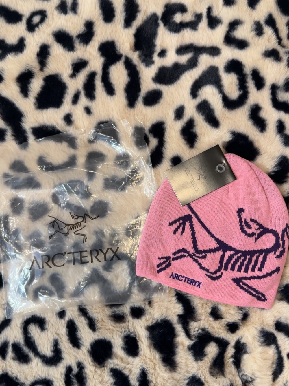 Arc'teryx Pink Kids Beanie with Navy Skeleton Logo